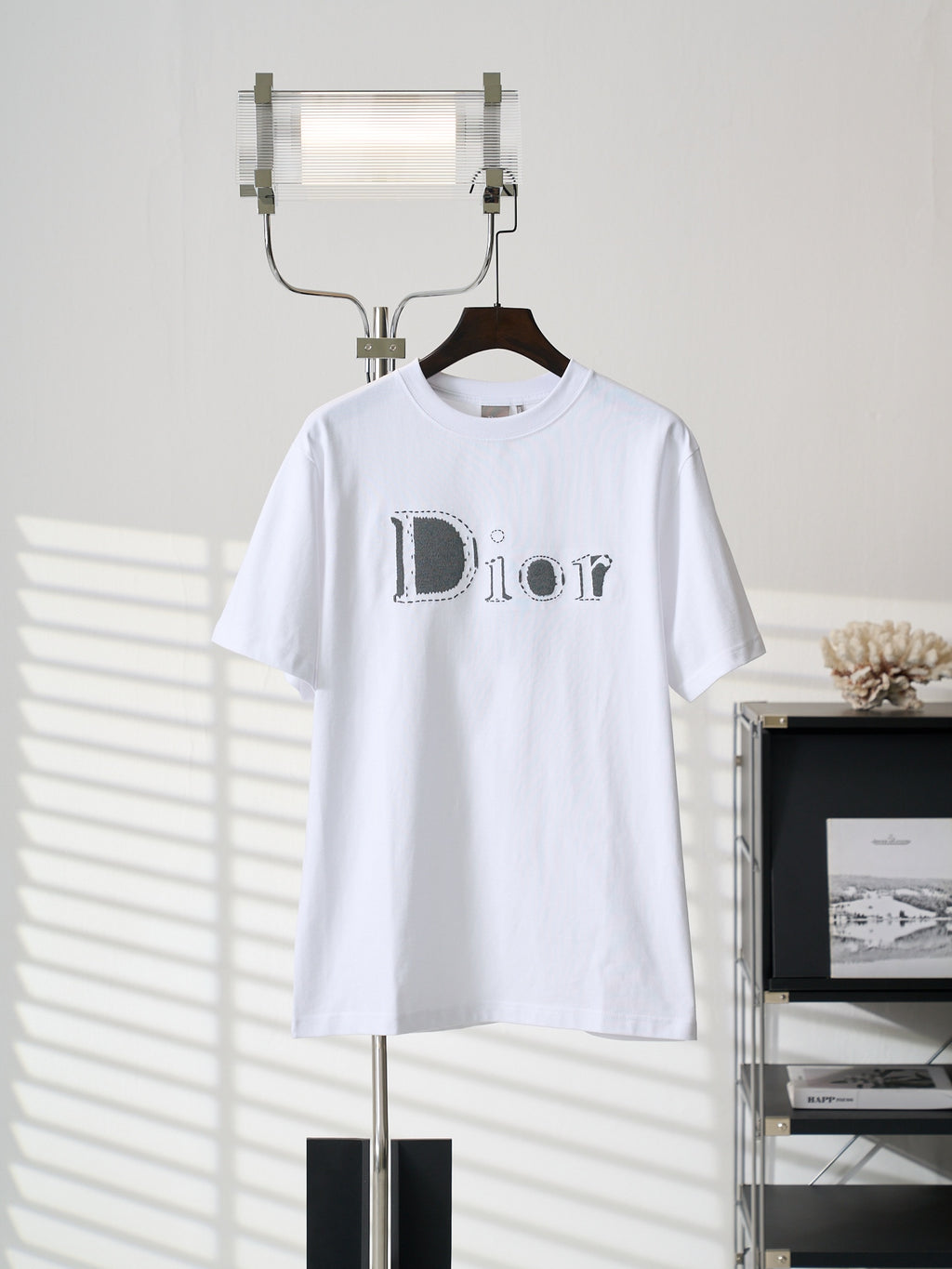 White Dior logo T-shirt on hanger