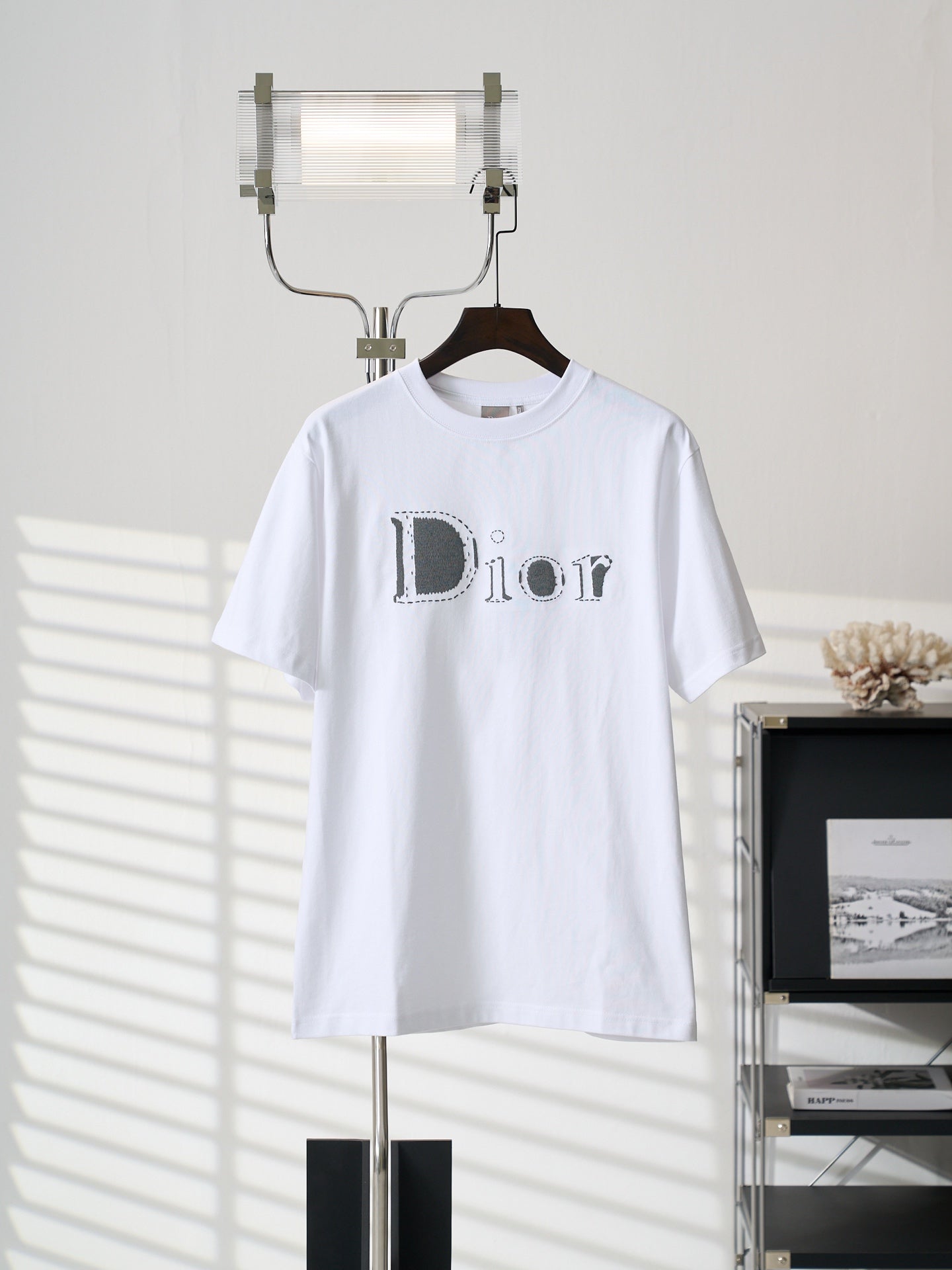White Dior logo T-shirt on hanger
