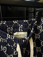 Gucci pants waistband detail in navy with GG monogram print, elastic opening