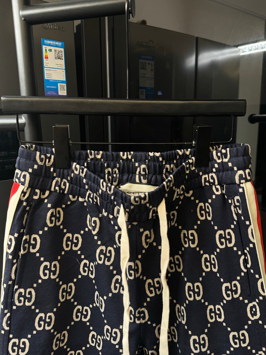 Gucci shorts-style pants in navy with GG monogram pattern and elastic waist