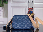 Louis Vuitton monogram shoulder bag with tan strap and front flap pocket
