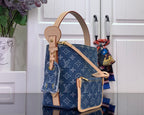 Louis Vuitton monogram denim-style tote with crossbody strap and tan leather trim