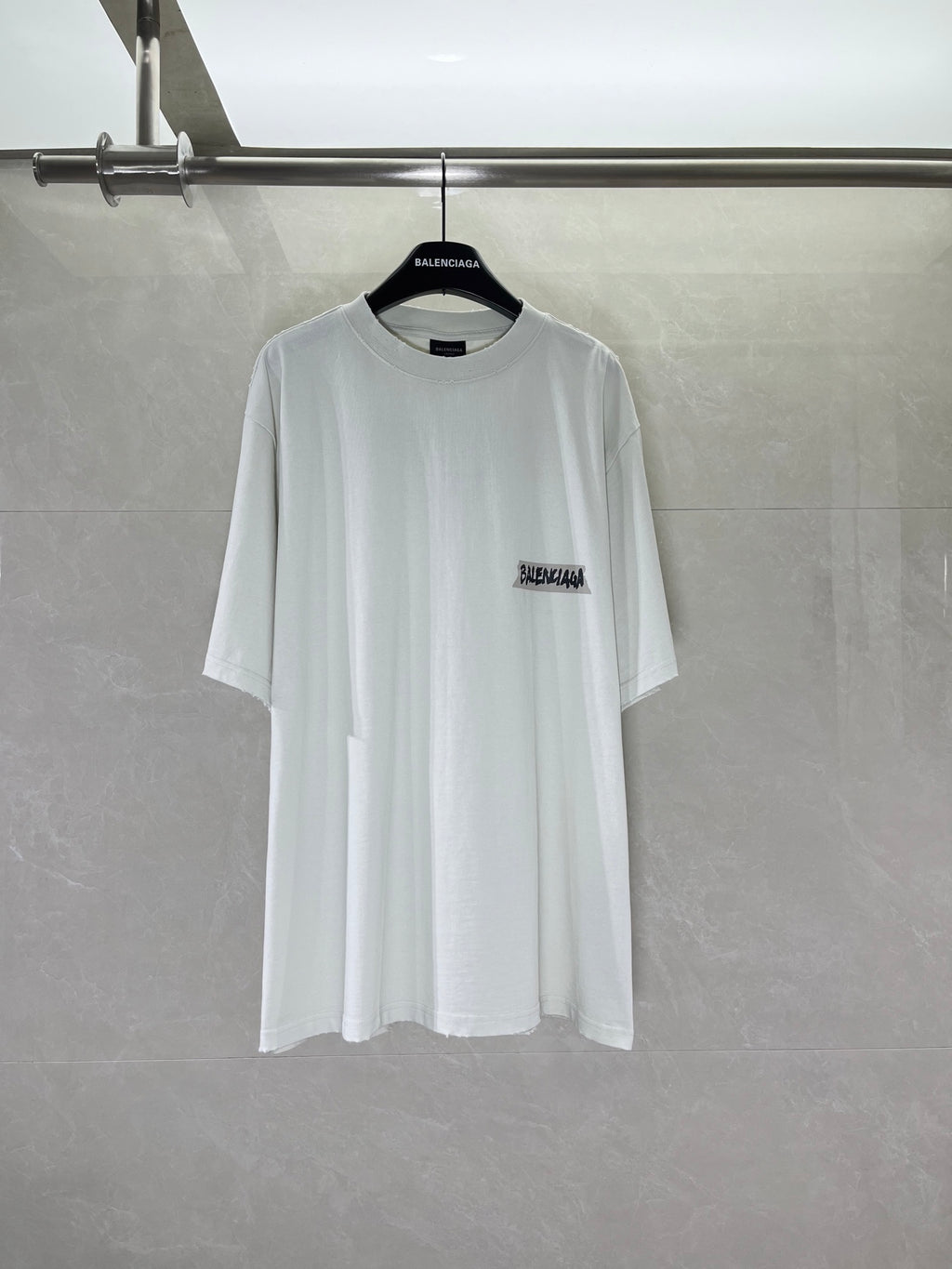White Balenciaga T-shirt with small chest logo, crew neck, short sleeves