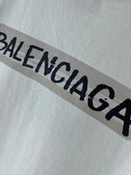 White Balenciaga T-shirt with bold black BALENCIAGA logo across chest