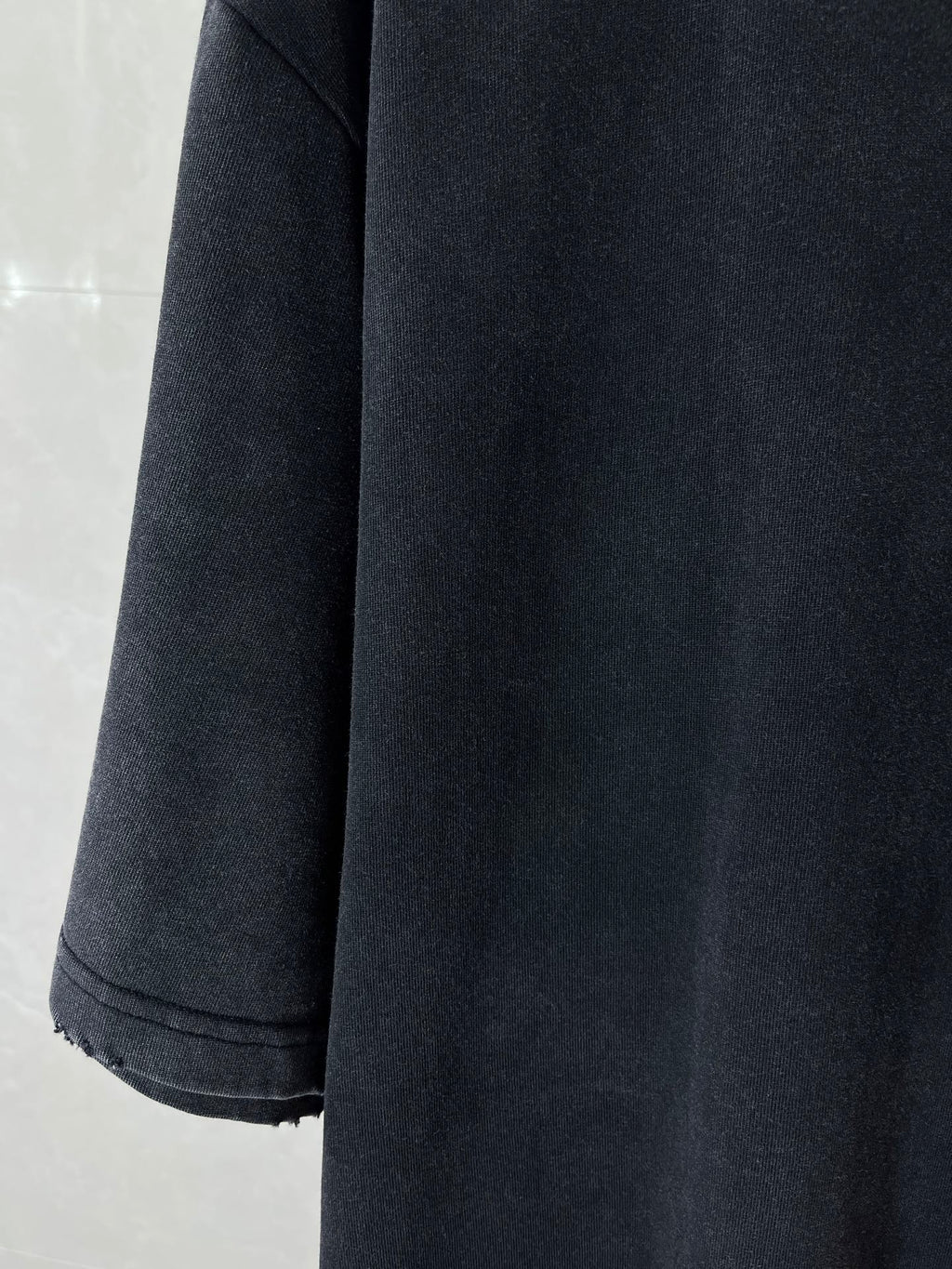 Dark navy short-sleeve T-shirt with stitched sleeve cuff and straight hem
