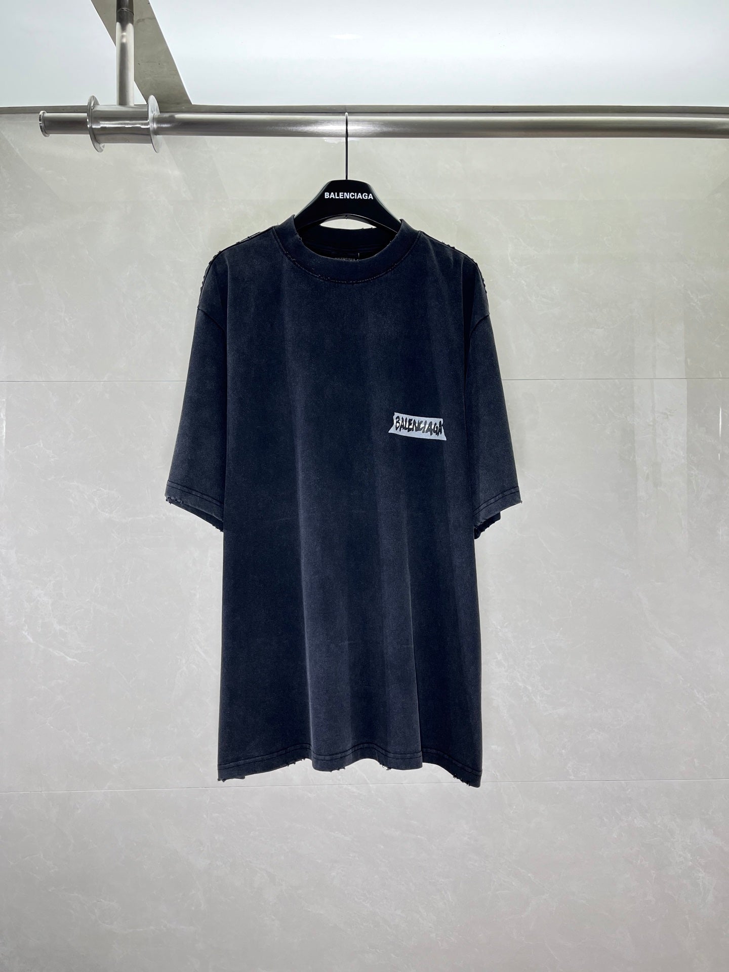 Short-sleeve T-shirt in dark navy with small BALENCIAGA chest graphic