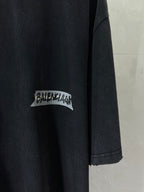 Dark navy short-sleeve T-shirt with BALENCIAGA logo patch on sleeve