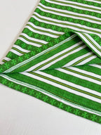 Close-up of green striped T-shirt hem with double-stitched edge
