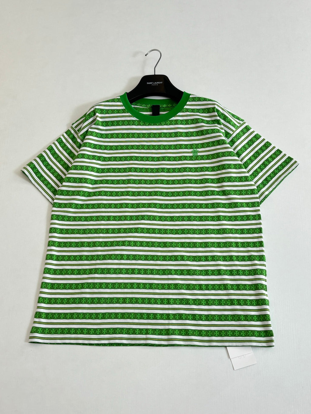 Green and white striped short-sleeve T-shirt with crew neck and hem tag