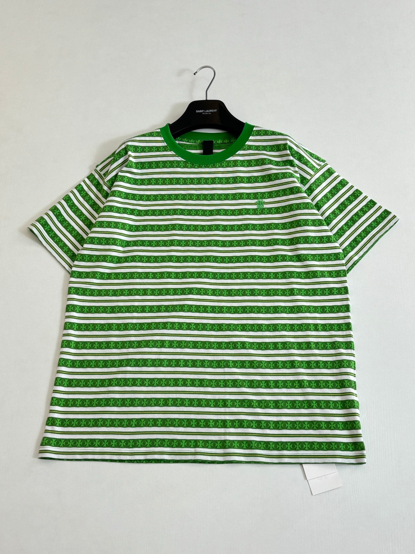 Green and white striped short-sleeve T-shirt with crew neck and hem tag