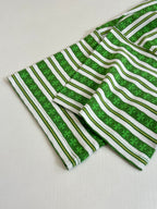 Green striped short-sleeve T-shirt laid flat, crew neck and sleeve visible