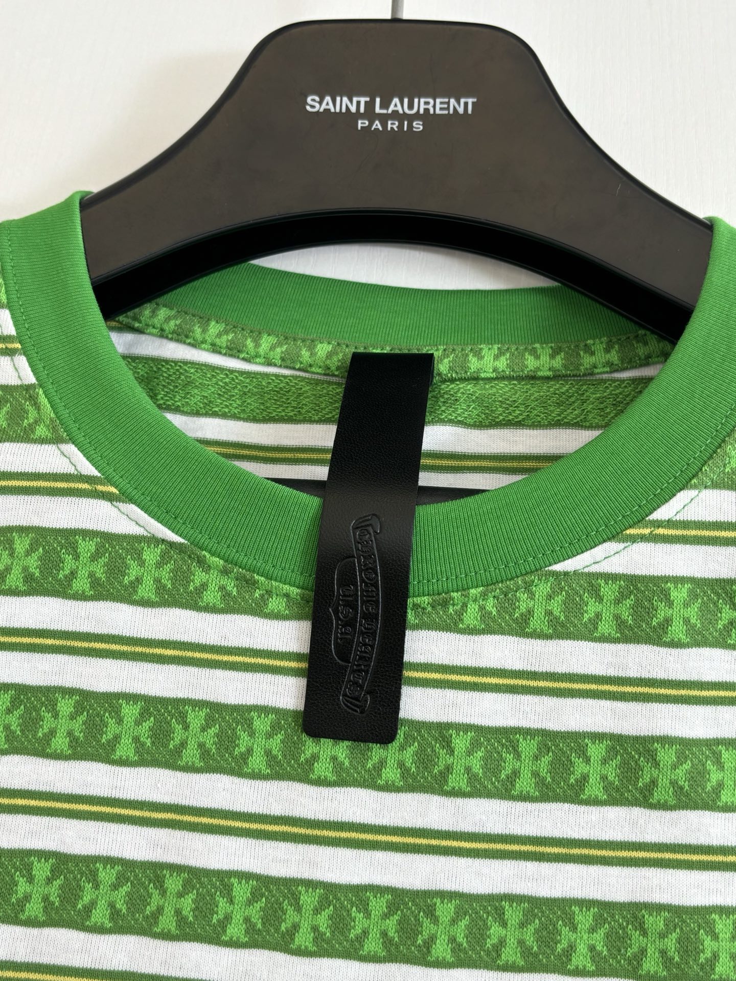 Green crew neck T-shirt with white stripes and small pattern; SAINT LAURENT PARIS label
