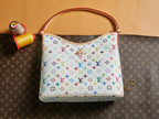 Multicolor monogram handbag with top handle and front panel with hanging charm