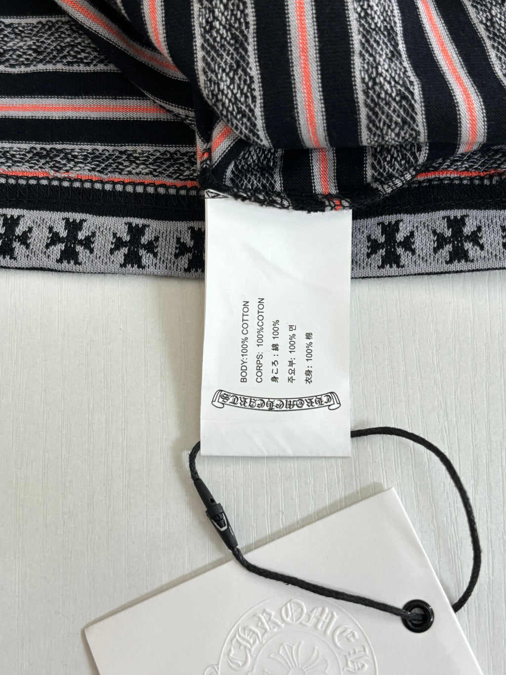 Striped T-shirt with interior neck label and hang tag attached