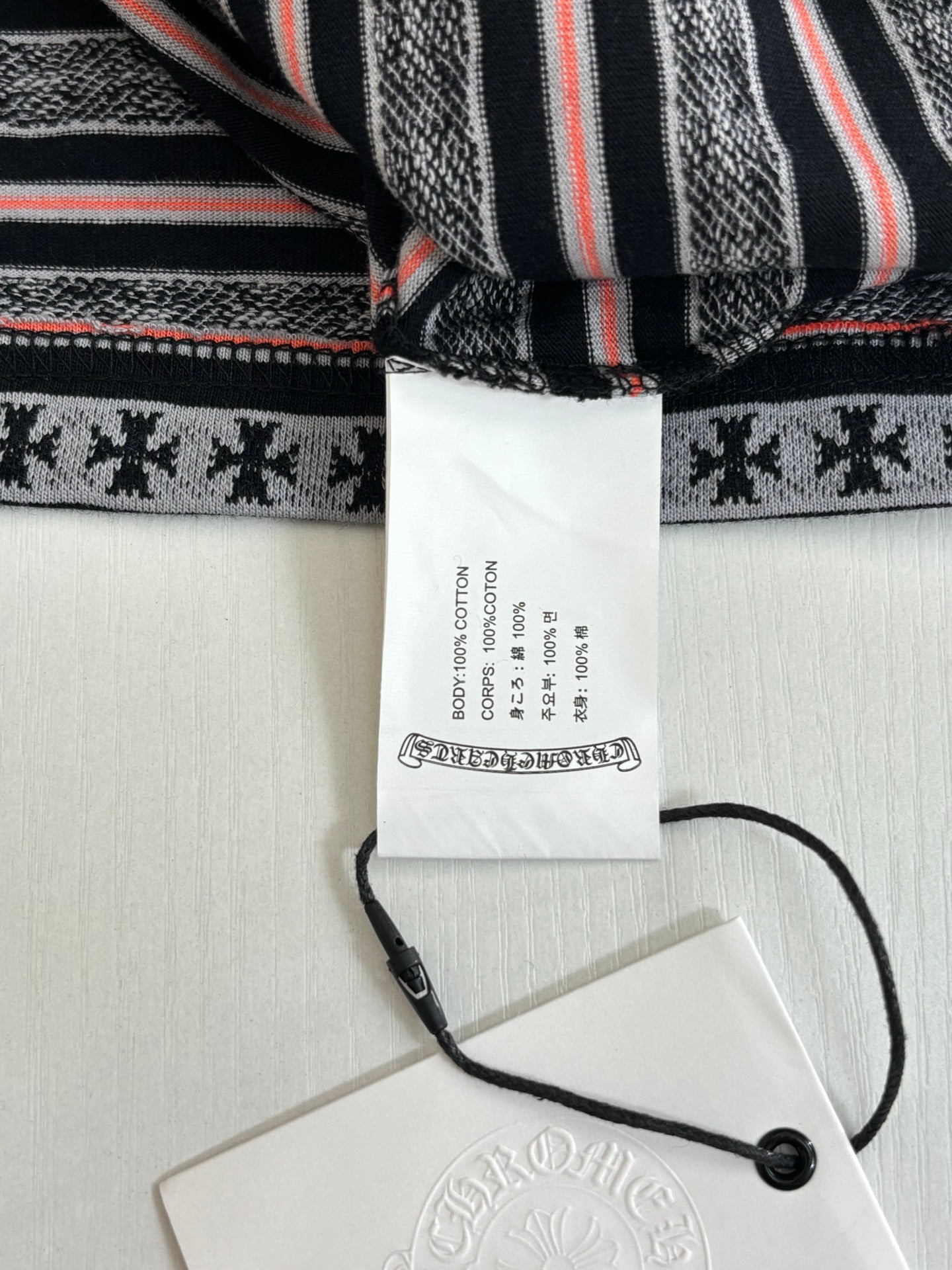 Striped T-shirt with interior neck label and hang tag attached