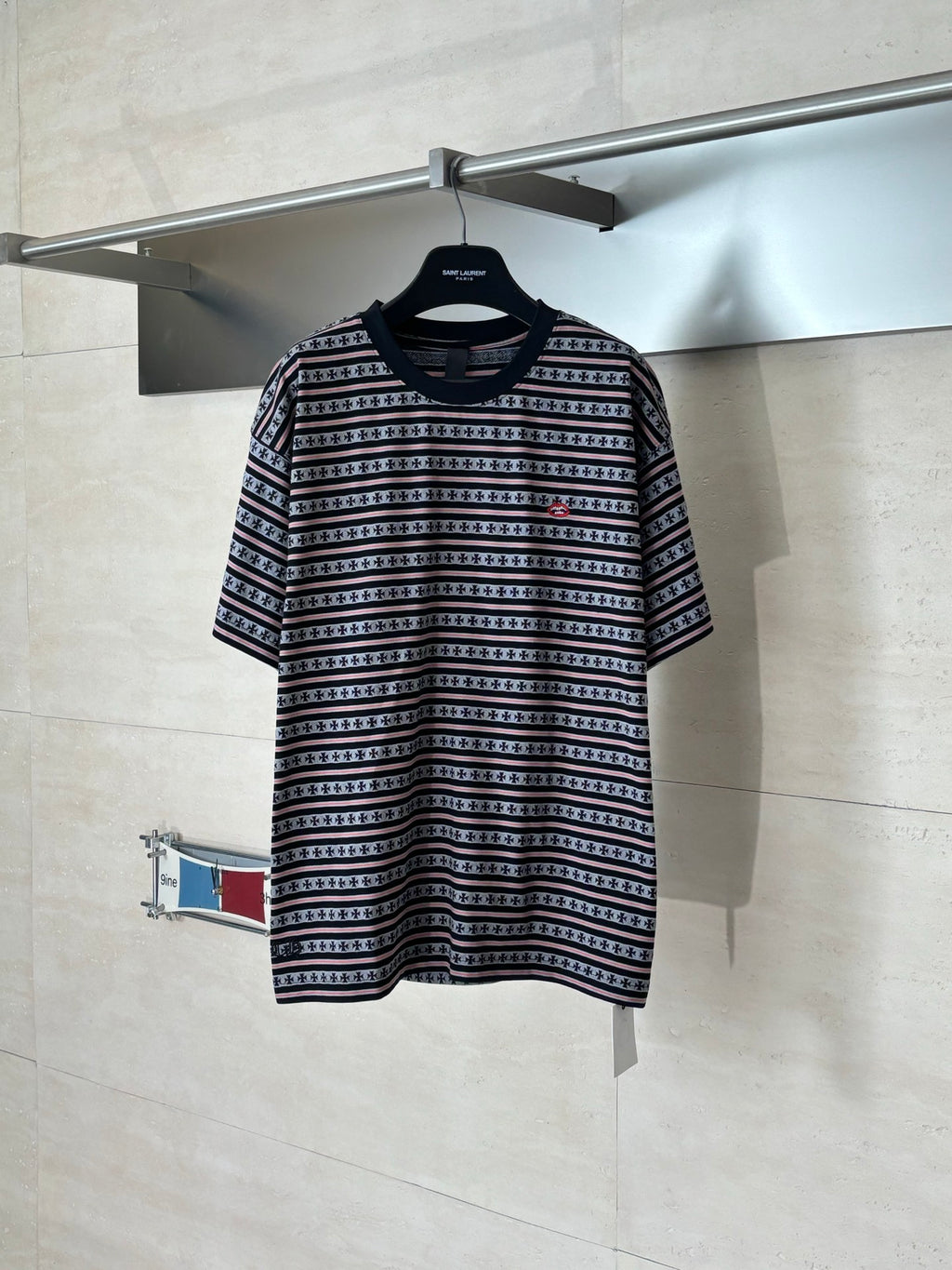 Crew-neck short-sleeve T-shirt with black, white, and red striped pattern