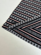 Striped short-sleeve T-shirt with repeating motif bands and red-and-white lines
