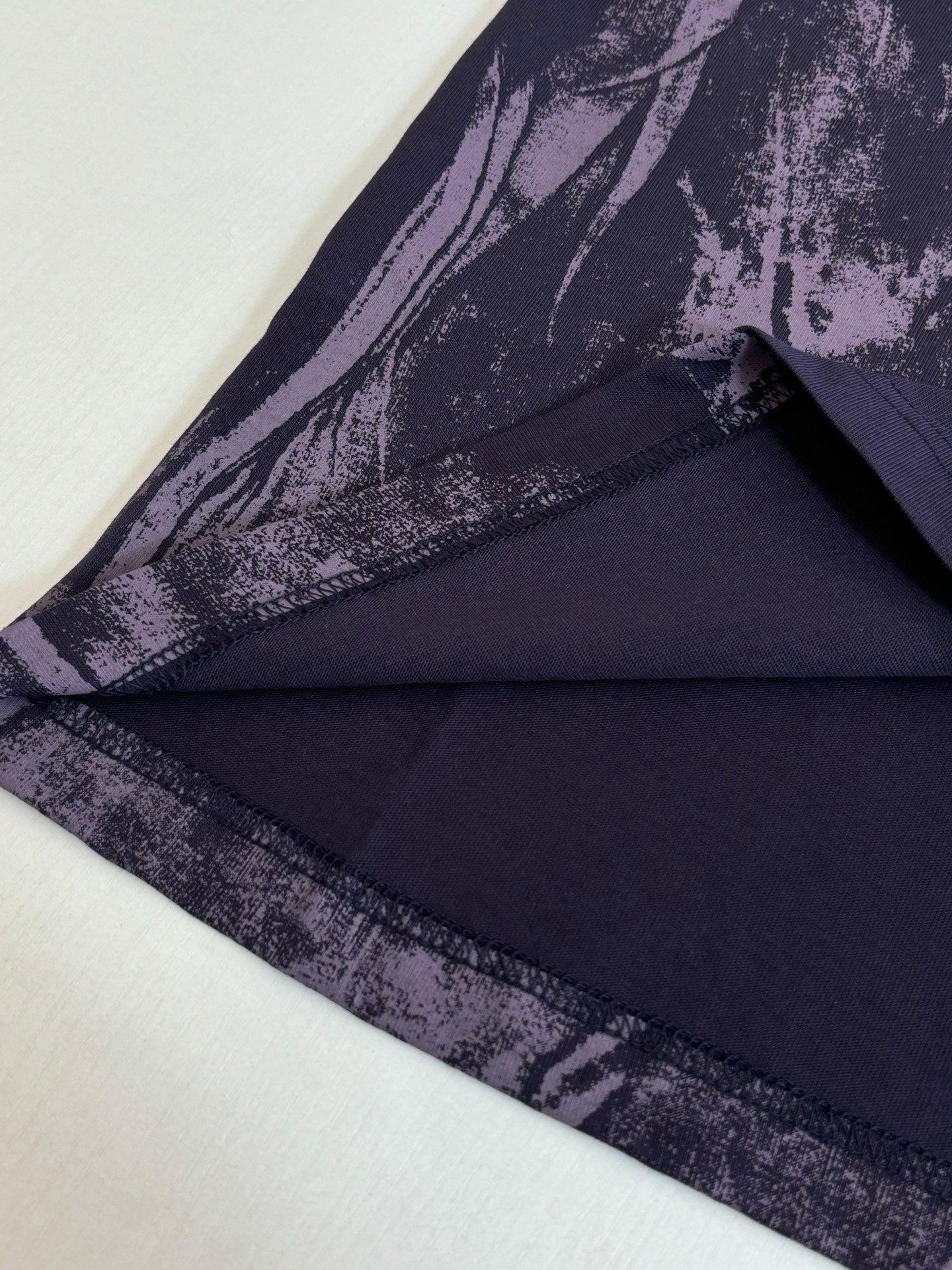 Louis Vuitton T-shirt sleeve and hem detail, purple abstract print