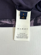 Louis Vuitton clothing care label on T-shirt size S, Italy