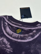 Louis Vuitton T-shirt neck detail with printed label at collar