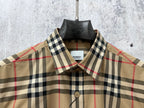 Burberry plaid button-up shirt collar with logo label