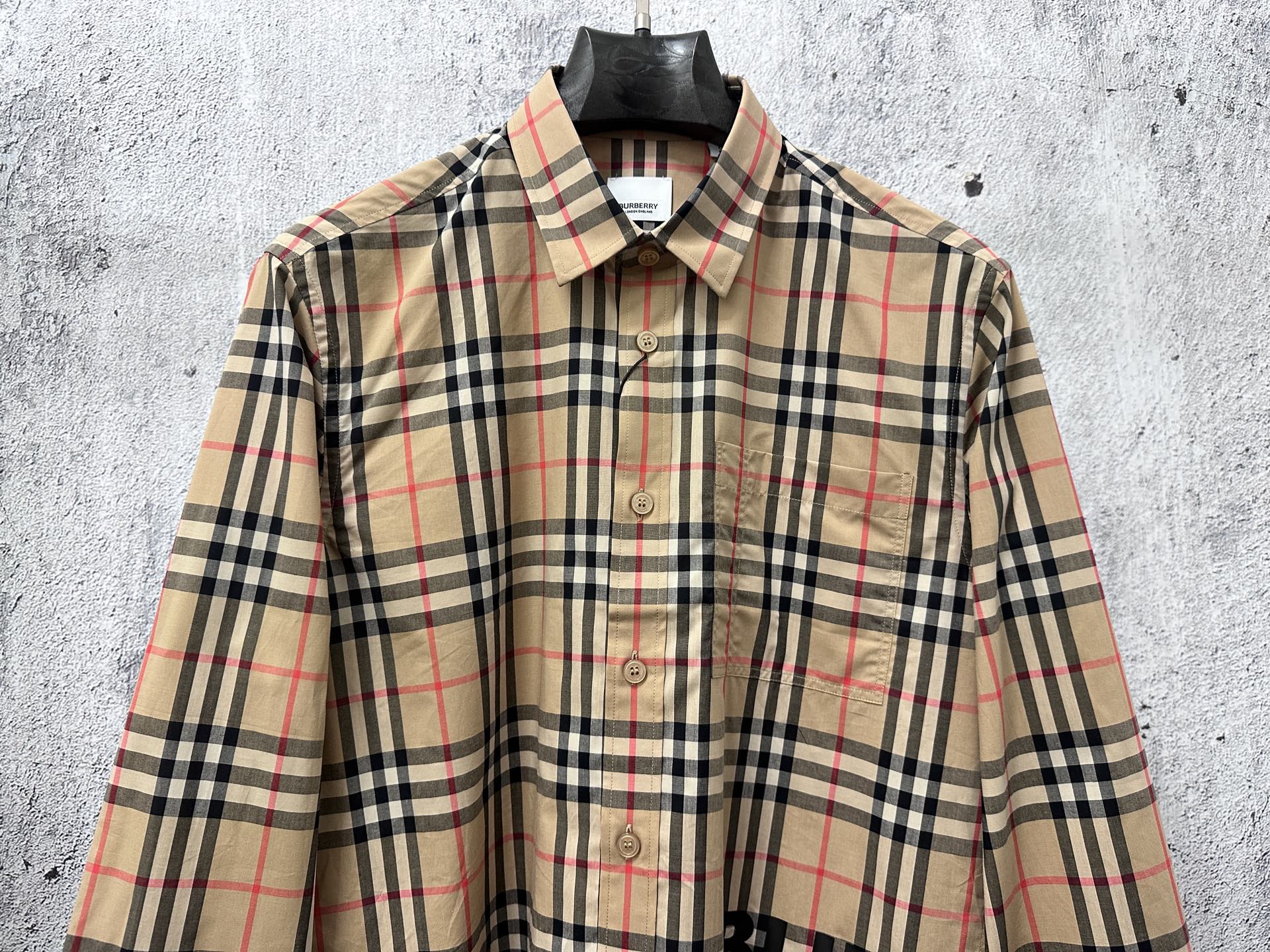Burberry plaid long-sleeve button-up shirt with front placket and chest logo graphic