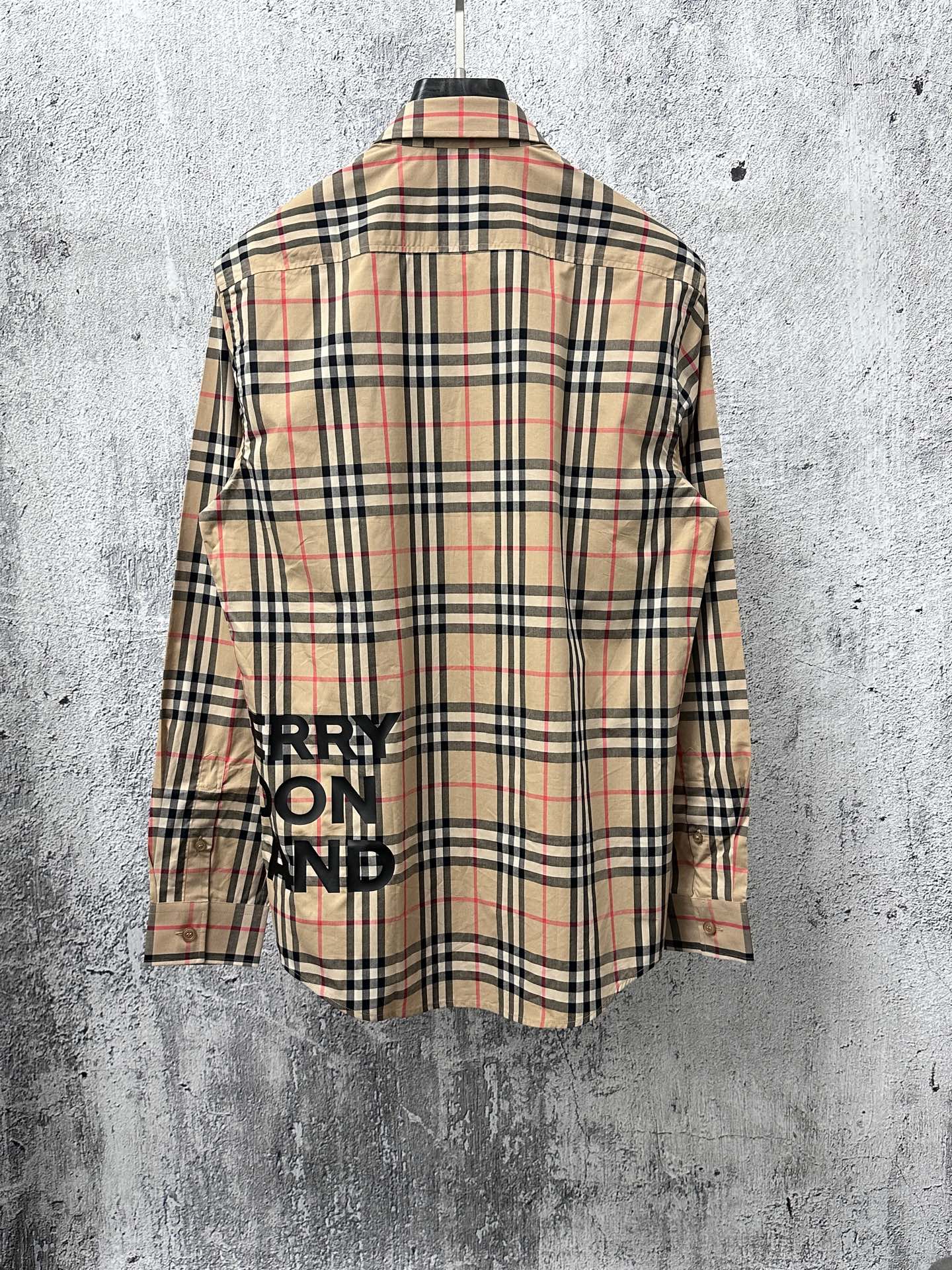 Burberry plaid button-up shirt back view with logo graphic on chest
