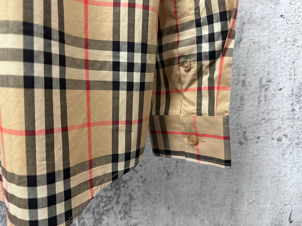 Burberry plaid shirt cuff with button and sleeve pocket detail, beige with black and red
