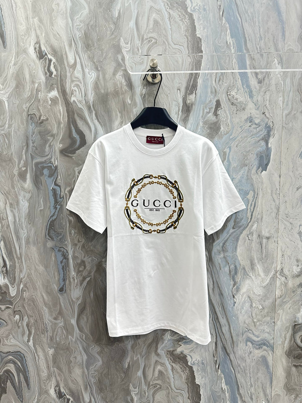 White short-sleeve T-shirt with Gucci chain emblem graphic