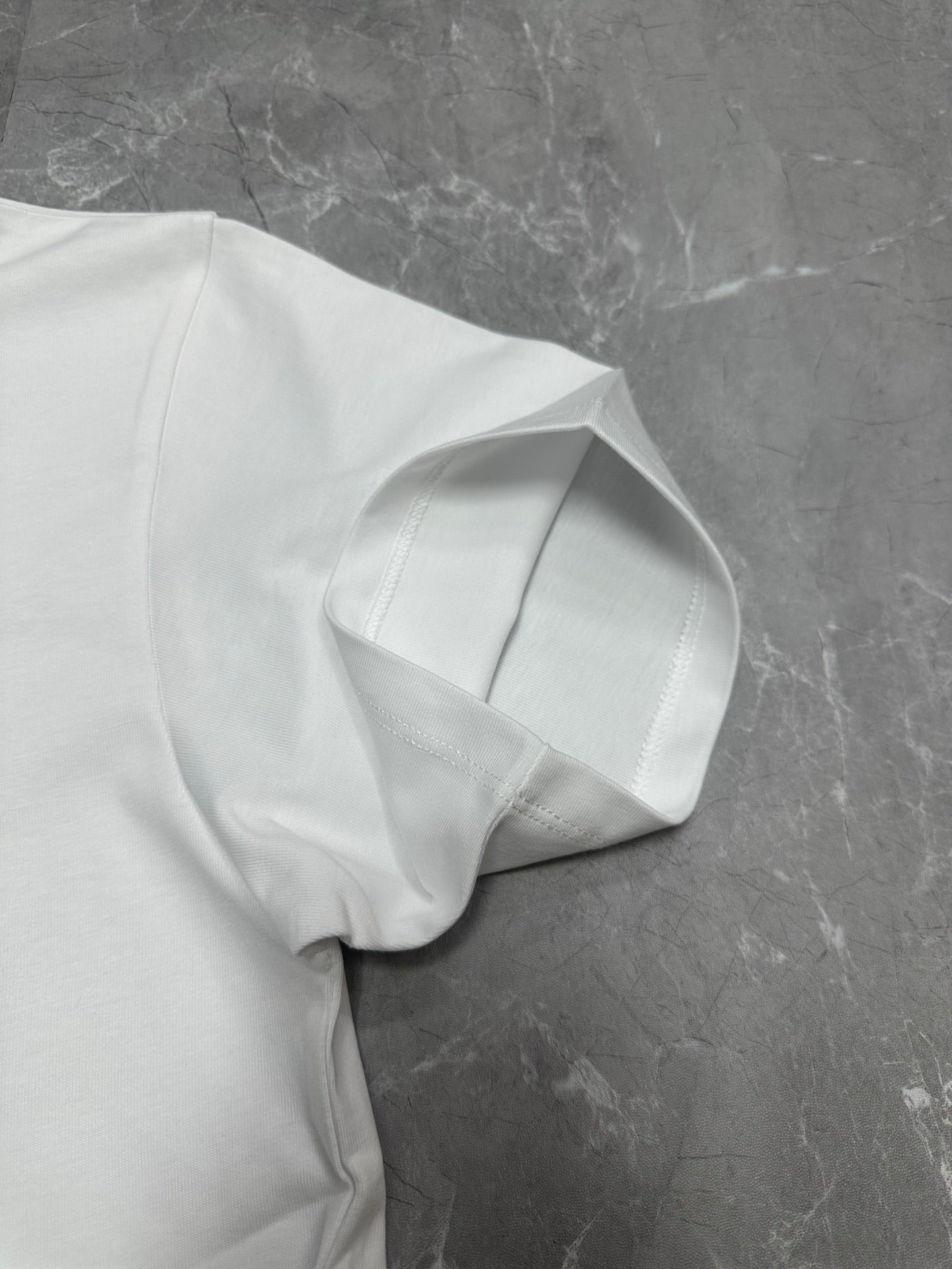 White short-sleeve T-shirt neckline and shoulder seam