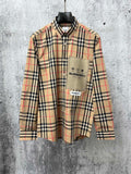Burberry check long-sleeve shirt in tan, black and red, front with pocket