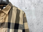 Long-sleeve button-up shirt collar and placket, beige and dark check plaid