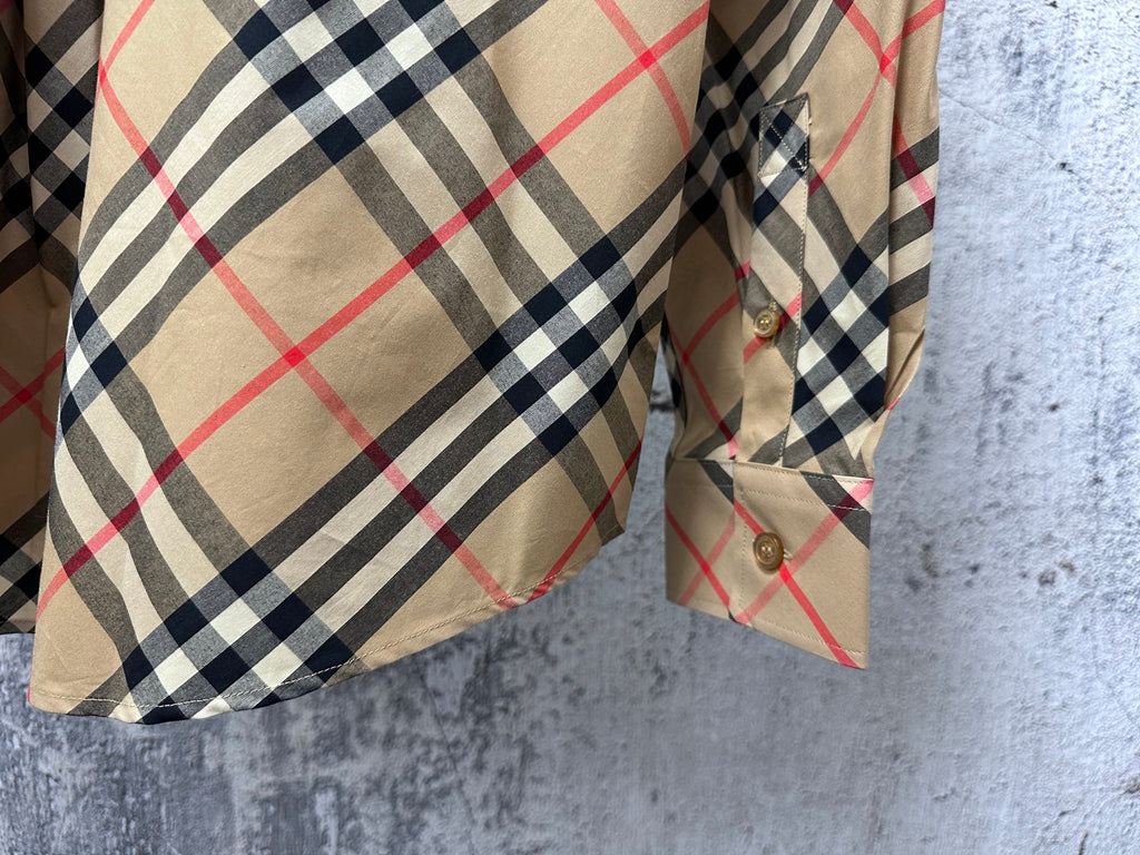 Burberry plaid long-sleeve shirt sleeve and cuff detail with beige, navy, and red plaid