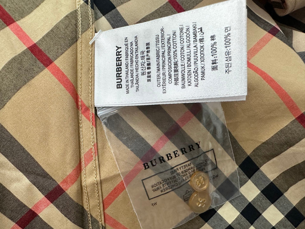 Burberry plaid shirt size and care label with hangtag, beige navy and red plaid.