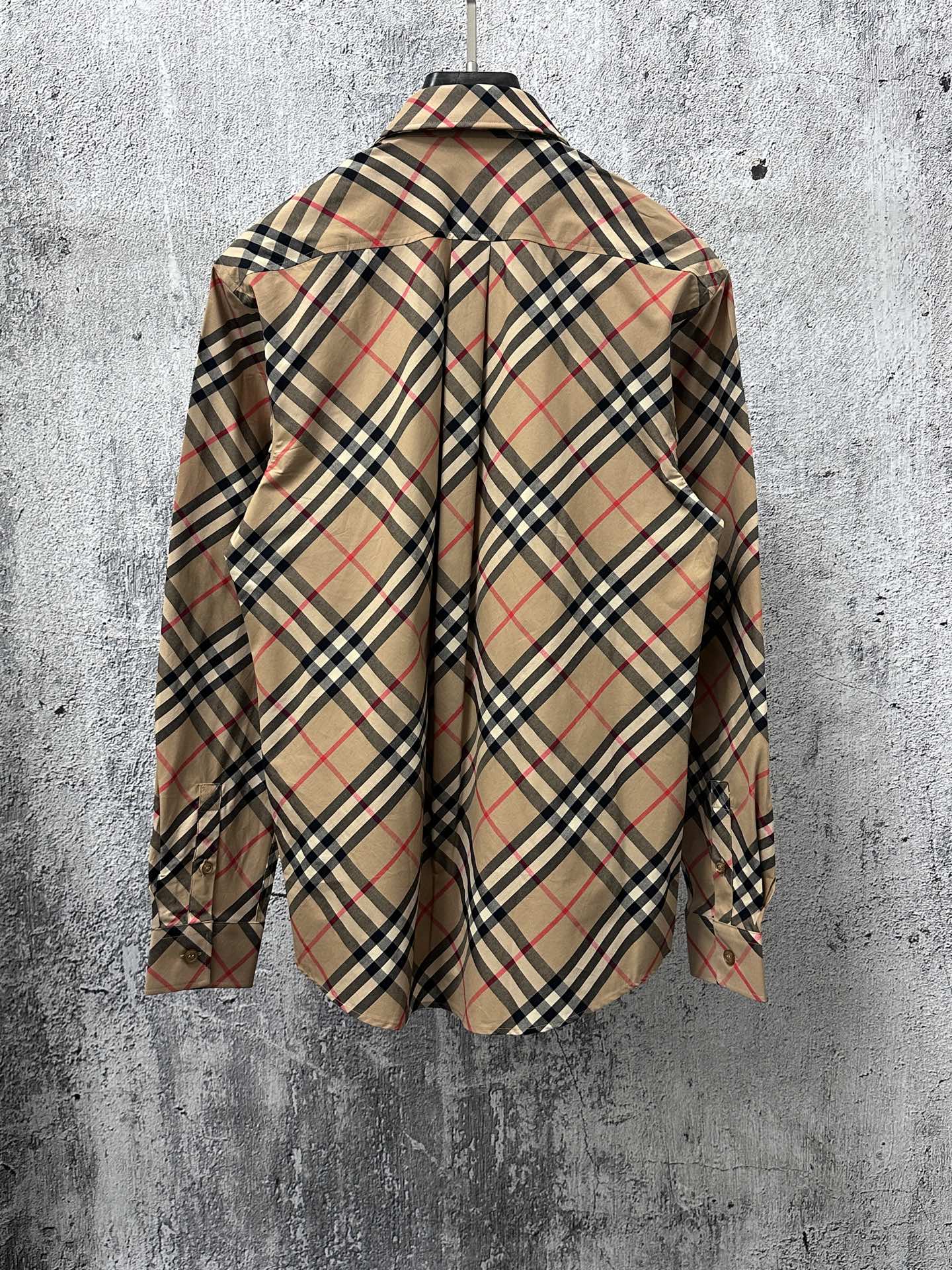 Burberry plaid long-sleeve shirt, back view, beige with navy and red check pattern.