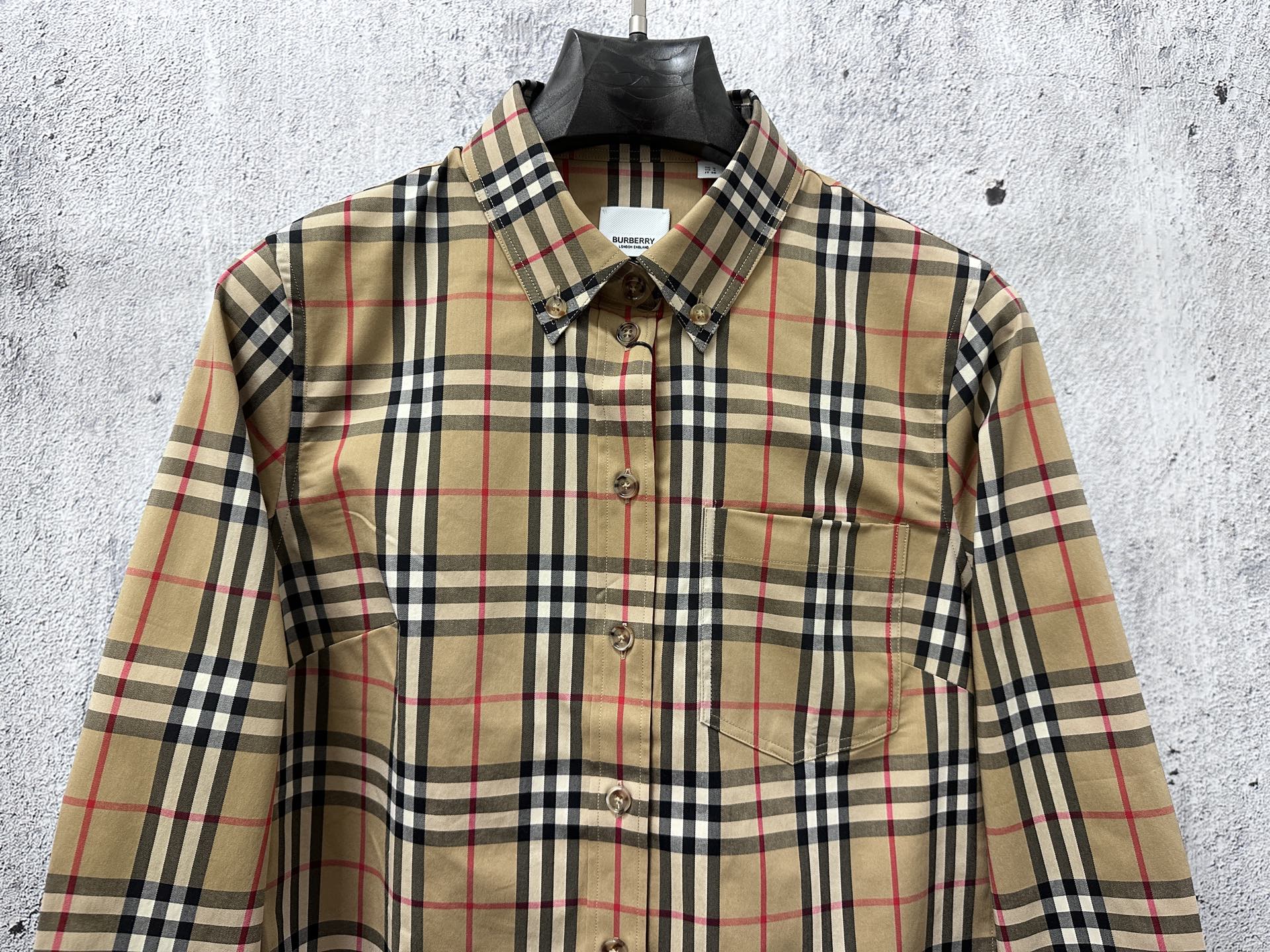 Burberry long-sleeve plaid shirt front view in beige, navy, and red