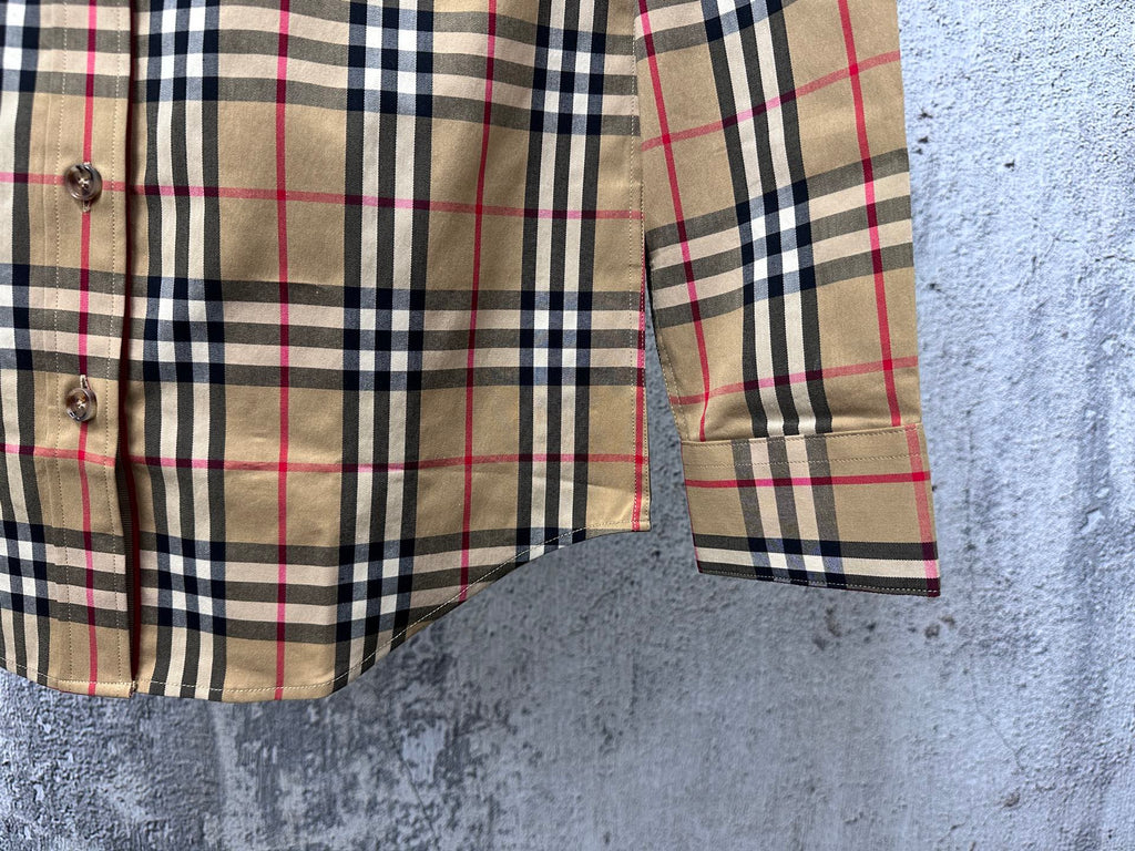Burberry plaid shirt sleeve and hem with button cuff detail