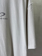 Balenciaga short-sleeve T-shirt side view with partial heart logo on light fabric