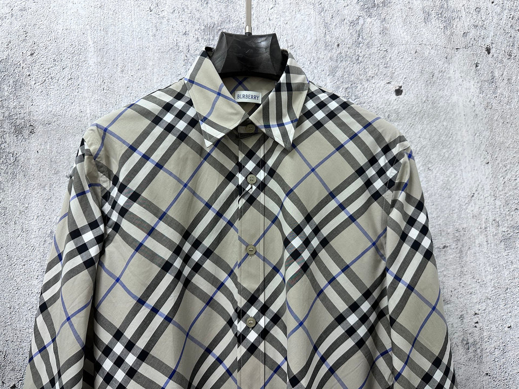 Burberry plaid button-up shirt front view with chest buttons