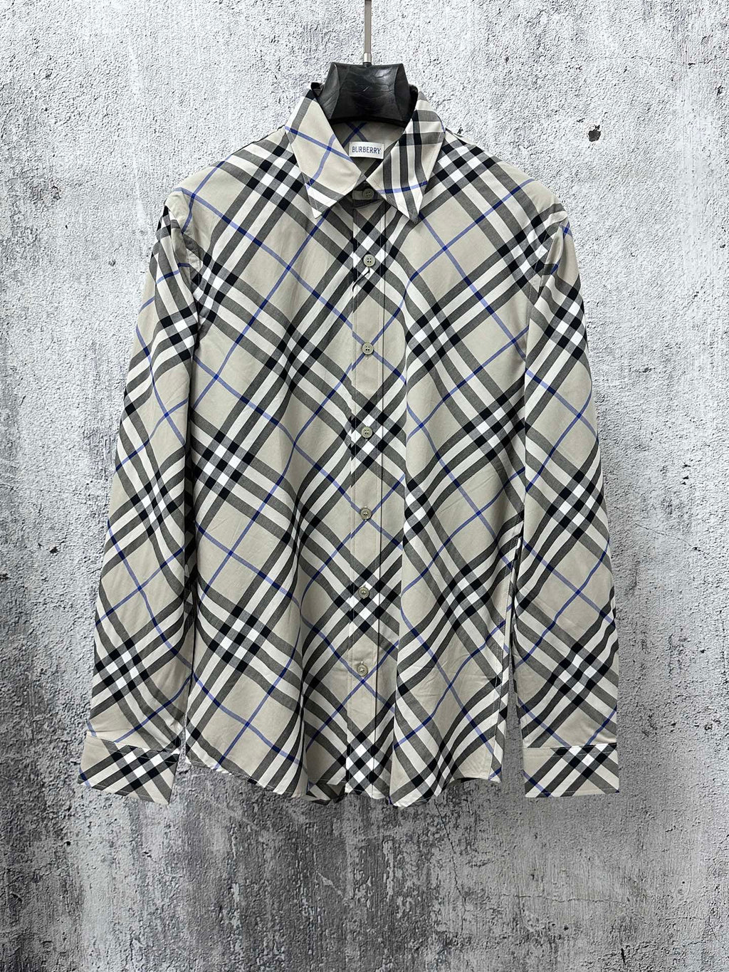 Burberry plaid button-up shirt with point collar and button front