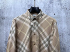Burberry plaid button-up shirt front, tan and light gray diamond check