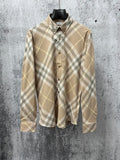 Light tan plaid long-sleeve button-up shirt with buttoned collar and Burberry label