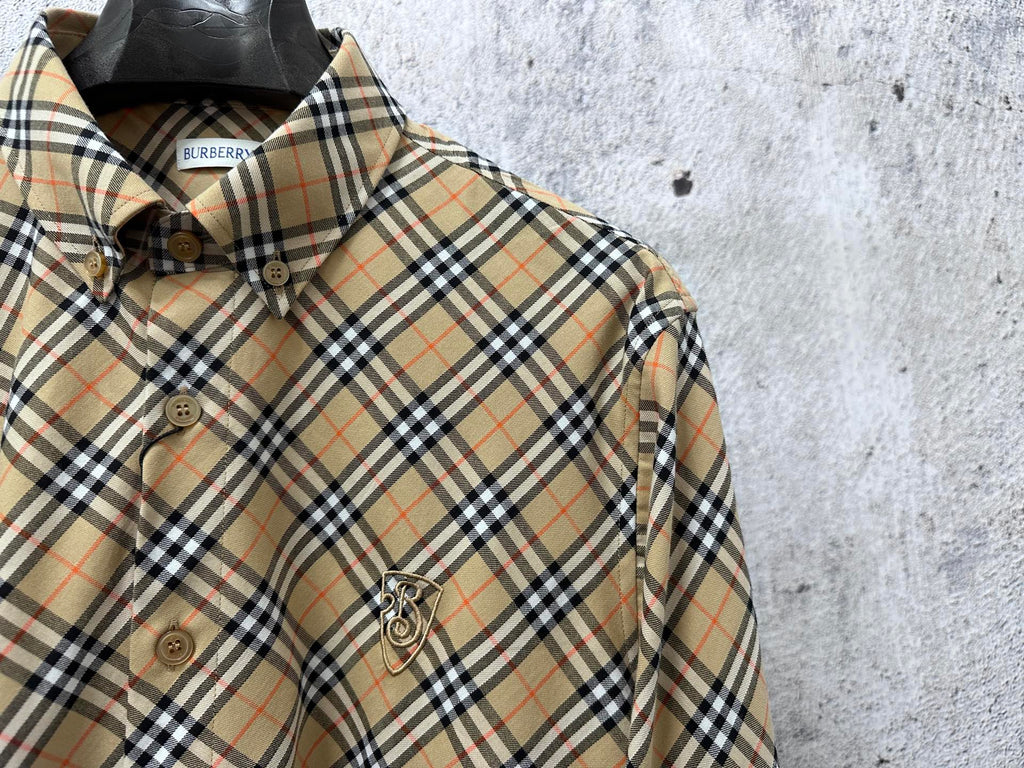 Burberry plaid long-sleeve shirt close-up, button placket and crest patch