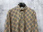 Burberry plaid long-sleeve button-up shirt on hanger