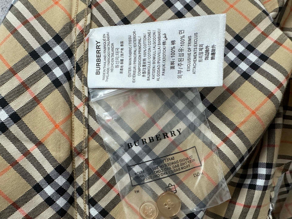 Burberry plaid shirt label and care tags inside collar