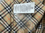 Burberry plaid shirt label and care tags inside collar