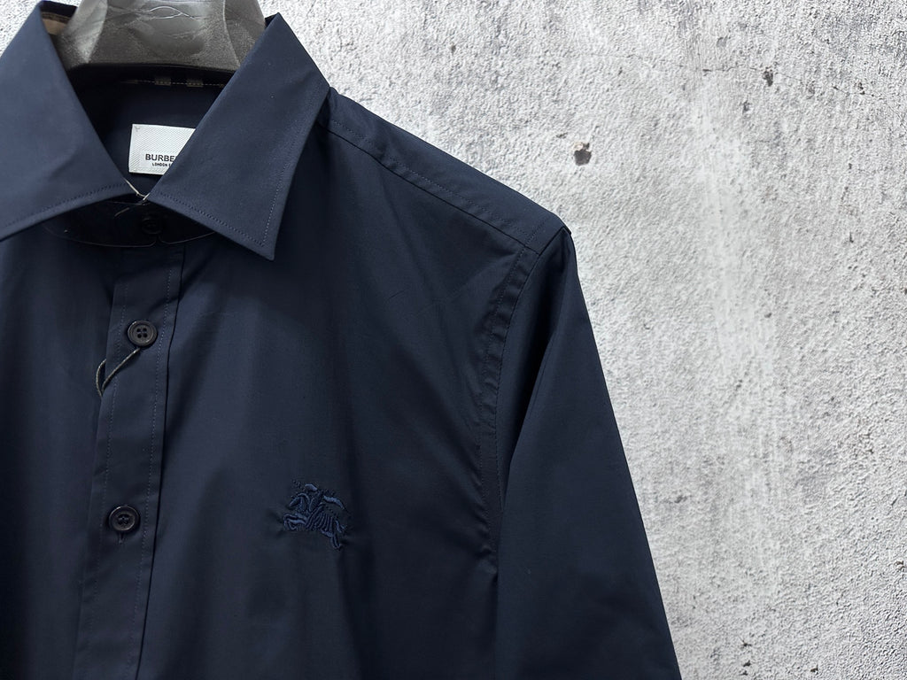 Burberry long-sleeve shirt detail, dark navy chest logo and button front
