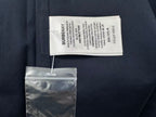 Burberry garment label on navy shirt with care text