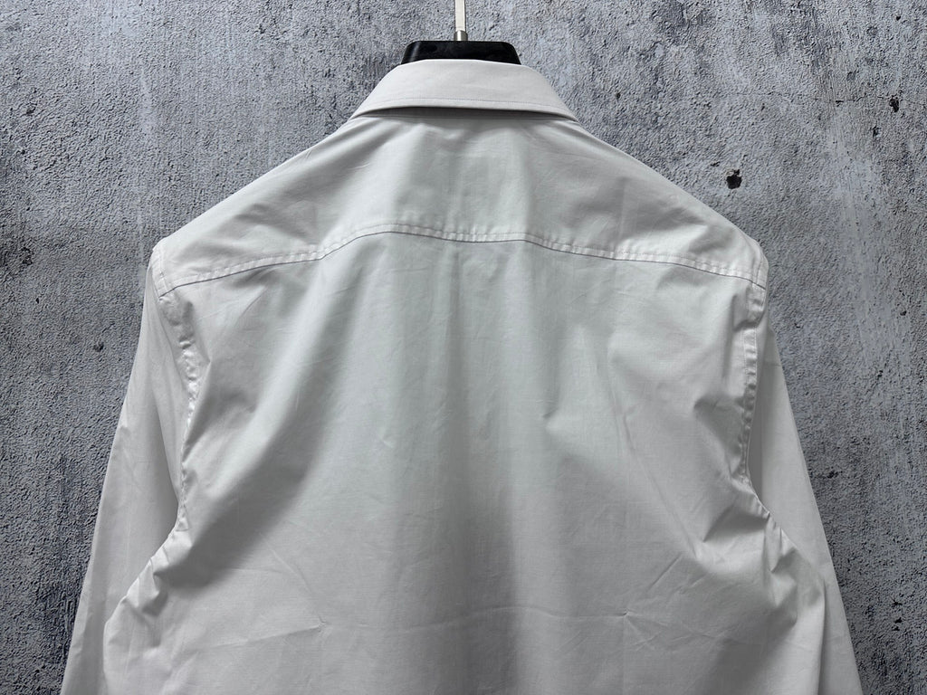 White long-sleeve shirt back with yoke seam and shoulder darts