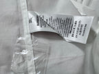 Burberry care label inside white shirt neck with printed sizing text